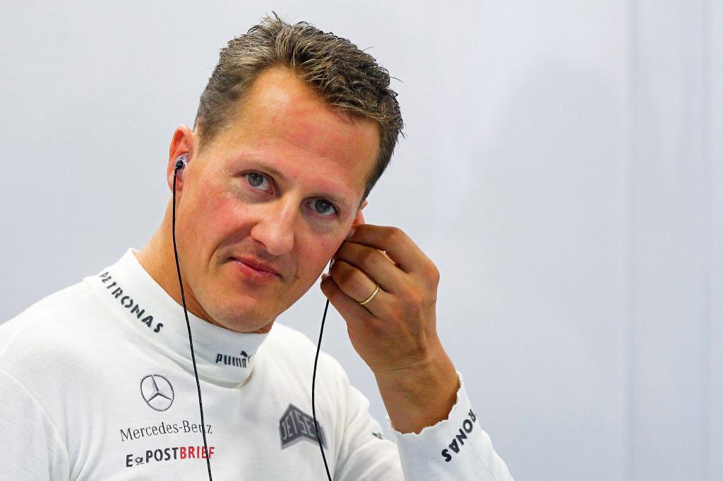 Michael Schumacher 2012 in Singapur. Kriminelle sollen versucht haben, die Familie des früheren Formel-1-Weltmeisters zu erpressen. - Foto: Diego Azubel/epa/dpa