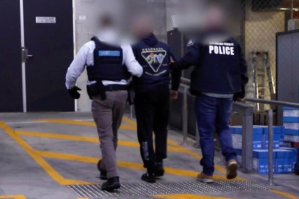 Die Verdächtigen wurden in einer komplexen Operation enttarnt. - Foto: Uncredited/AUSTRALIAN FEDERAL POLICE/AP/dpa