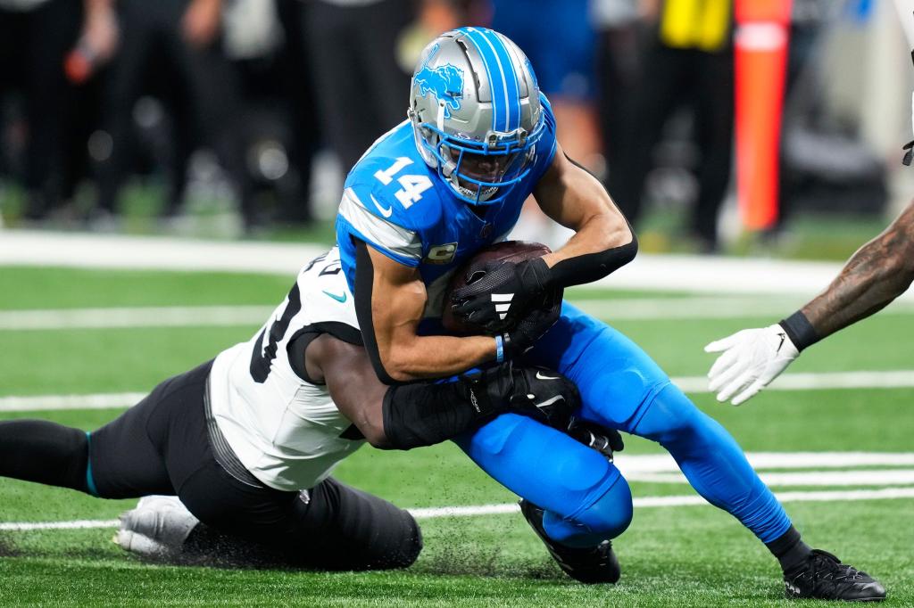 Zwei weitere Touchdowns in einer starken Saison: Amon-Ra St. Brown und die Detroit Lions dominieren in der NFL. - Foto: Carlos Osorio/AP/dpa