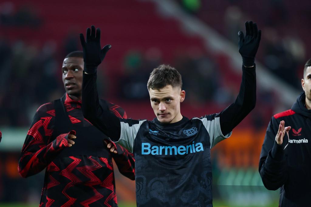 Hat seinen Vertrag in Leverkusen einem Bericht zufolge verlängert: Nationalspieler Florian Wirtz. - Foto: Daniel Löb/dpa